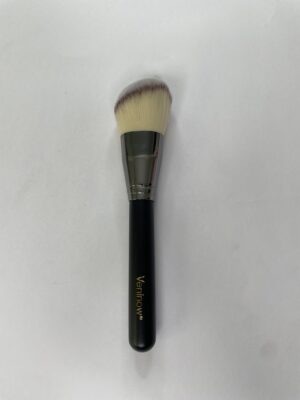 Angled contour brush for precise application of contour and highlighting products, creating sharp and defined cheekbones
